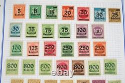 Collection de 2 400+ timbres d'Allemagne neufs et utilisés rangés dans un album