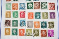 Collection de 2 400+ timbres d'Allemagne neufs et utilisés rangés dans un album