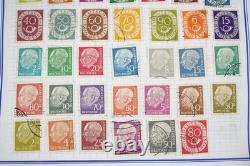 Collection de 2 400+ timbres d'Allemagne neufs et utilisés rangés dans un album