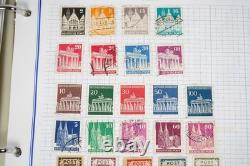 Collection de 2 400+ timbres d'Allemagne neufs et utilisés rangés dans un album