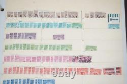Collection de 2775+ timbres allemands neufs et utilisés stockés dans un album sur des pages de stock