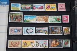 Collection de Nouvelle-Zélande de plus de 1 500 timbres neufs et usagés stockés dans un album