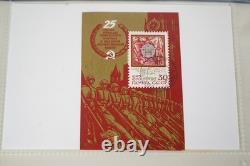 Collection de Russie de 250+ timbres et feuillets-souvenirs neufs et utilisés rangés dans un album bleu