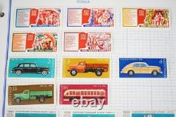 Collection de Russie de plus de 1 300 timbres neufs et usagés stockés dans un album Voyager