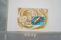 Collection de Russie de plus de 250 timbres et feuillets souvenirs, neufs et oblitérés, conservés dans un album bleu