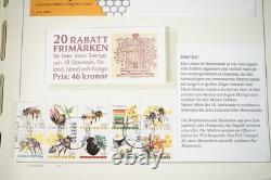 Collection de Suède de plusieurs centaines de timbres neufs, FDC et livrets dans un album