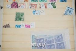 Collection de Yougoslavie de 1175+ timbres neufs et utilisés dans un album sur des pages de stockage