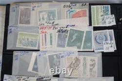 Collection de Yougoslavie de 1175+ timbres neufs et utilisés dans un album sur des pages de stockage