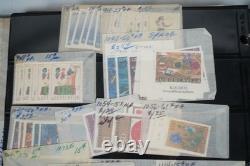 Collection de Yougoslavie de 1175+ timbres neufs et utilisés dans un album sur des pages de stockage