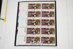 Collection de blocs de planche neufs de diverses tailles de 150 timbres américains 1975-1979 stockée dans un album