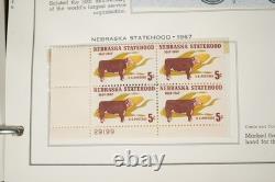 Collection de blocs de plaques de 280 + timbres neufs des États-Unis 1967-1978 dans un album Minkus