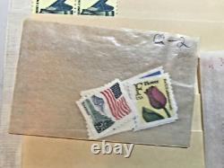 Collection de bobines des États-Unis (750+) sur 14 pages dans un ancien album White Ace, 1939-1988