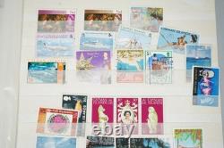 Collection de colonies britanniques de plus de 550 timbres neufs et oblitérés dans un stockbook Uni-Safe
