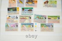 Collection de colonies britanniques de plus de 550 timbres neufs et oblitérés dans un stockbook Uni-Safe