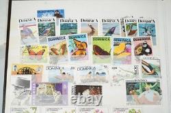 Collection de colonies britanniques de plus de 550 timbres neufs et oblitérés dans un stockbook Uni-Safe