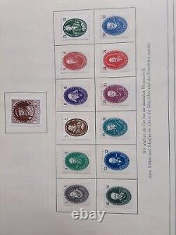 Collection de grande valeur Allemagne RDA dans un album rare de timbres non utilisés + blocs RDA