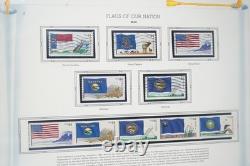 Collection de quelques centaines de timbres US 2010 neufs et utilisés stockés dans un album White Ace