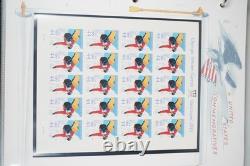 Collection de quelques centaines de timbres US 2010 neufs et utilisés stockés dans un album White Ace