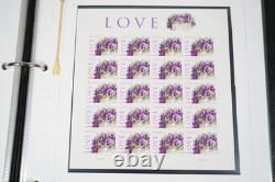 Collection de quelques centaines de timbres US 2010 neufs et utilisés stockés dans un album White Ace