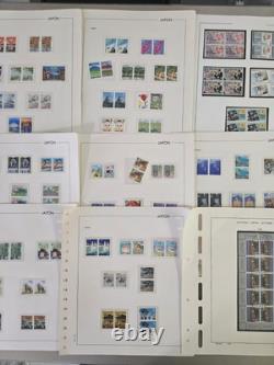 Collection de timbres MD WW dans une grande boîte prioritaire