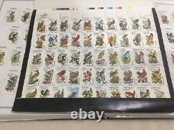 Collection de timbres américains 1860-2004 dans l'album Scott
