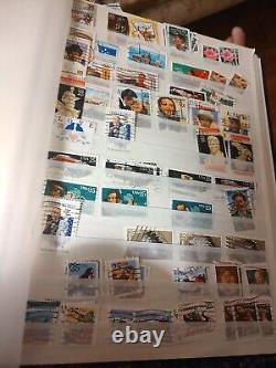 Collection de timbres américains dans un superbe classeur de stockage sécurisé. Une grande valeur.