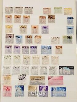 Collection de timbres anciens de l'UAR du Moyen-Orient en vrac dans un album Lighthouse et sur des pages détachées.