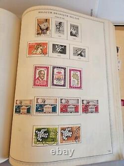 Collection de timbres belges dans un album Minkus Plus de 2000 timbres au total