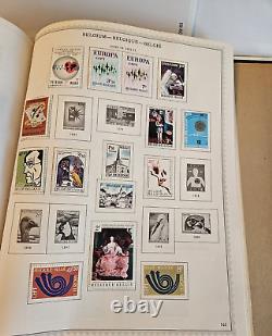 Collection de timbres belges dans un album Minkus Plus de 2000 timbres au total