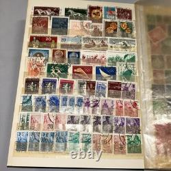 Collection de timbres d’Allemagne et d’Angleterre dans un album