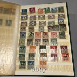 Collection de timbres d’Allemagne et d’Angleterre dans un album