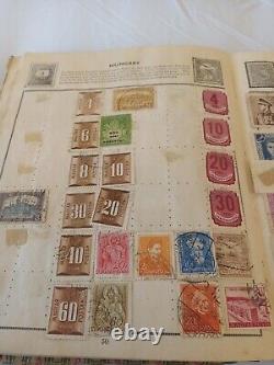 Collection de timbres dans un album à charnière 1850-1940