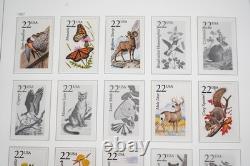 Collection de timbres des États-Unis 1978-1997 de plus de 525 timbres, principalement neufs, dans un album Davo, valeur faciale 260 $+