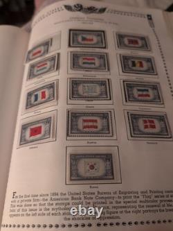 Collection de timbres des États-Unis à partir de 1897 dans un album Minkus bien rempli. Jugez par vous-même