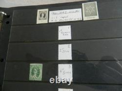 Collection de timbres du Queensland et timbres usagés sur pages Hagner dans un grand album