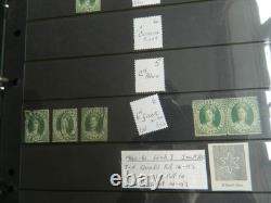 Collection de timbres du Queensland et timbres usagés sur pages Hagner dans un grand album
