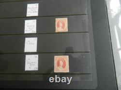 Collection de timbres du Queensland et timbres usagés sur pages Hagner dans un grand album
