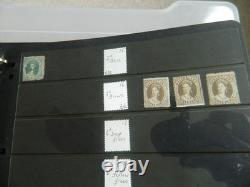 Collection de timbres du Queensland et timbres usagés sur pages Hagner dans un grand album