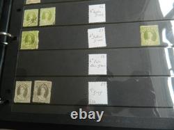 Collection de timbres du Queensland et timbres usagés sur pages Hagner dans un grand album