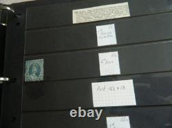 Collection de timbres du Queensland et timbres usagés sur pages Hagner dans un grand album