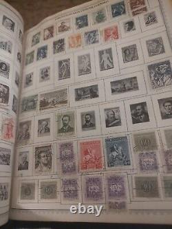 Collection de timbres du monde en 1958, album Minkus parfait. Des années 1800 à aujourd'hui. Voir