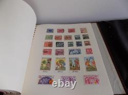 Collection de timbres du monde en 4 albums, du début à la modernité