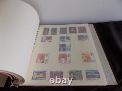 Collection de timbres du monde en 4 albums, du début à la modernité