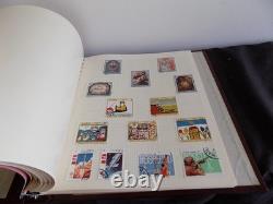 Collection de timbres du monde en 4 albums, du début à la modernité