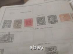 Collection de timbres du monde entier dans deux albums vintage de 1935 et 1928. WOW