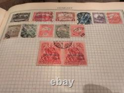 Collection de timbres du monde entier dans l'album énorme 'Standard' de Grosett et Dunlap 1934