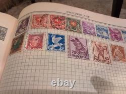 Collection de timbres du monde entier dans l'album énorme 'Standard' de Grosett et Dunlap 1934