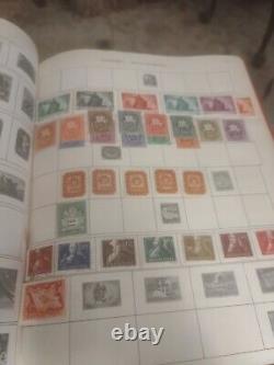 Collection de timbres du monde entier dans un album Minkus de 1952. Offre de grande valeur boutique.