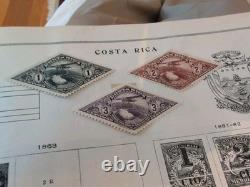 Collection de timbres du monde entier dans un album international Scott de 1933 en parfait état.