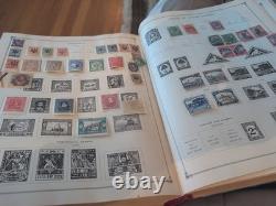 Collection de timbres du monde entier dans un album international Scott de 1933 en parfait état.